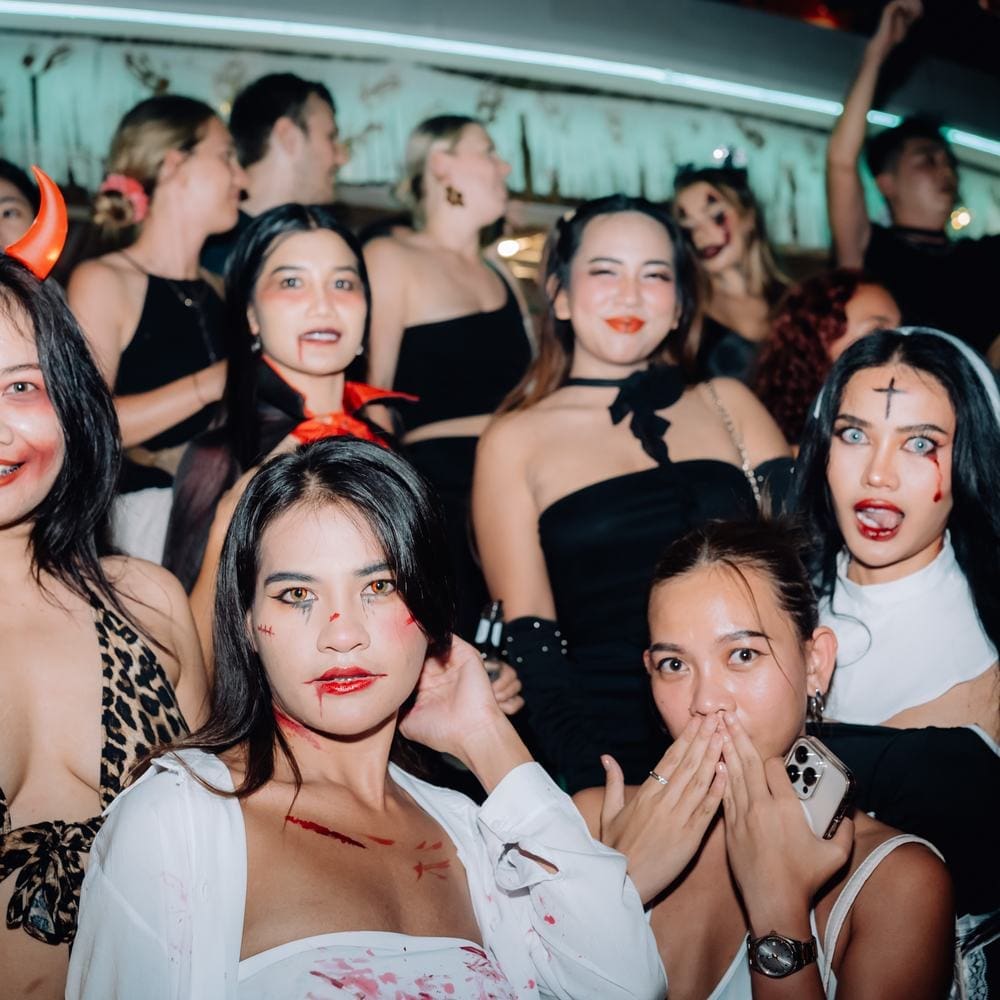 Guests in Halloween costumes and face paint at ARKbar, 2024